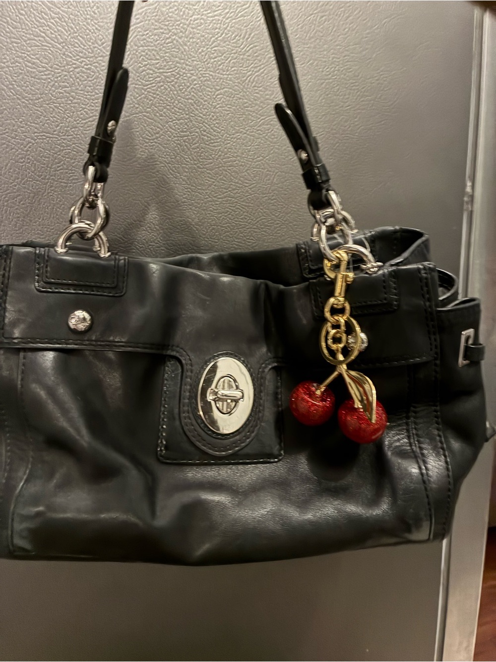Coach Black Leather Shoulder Bag with Red Cherry Charm